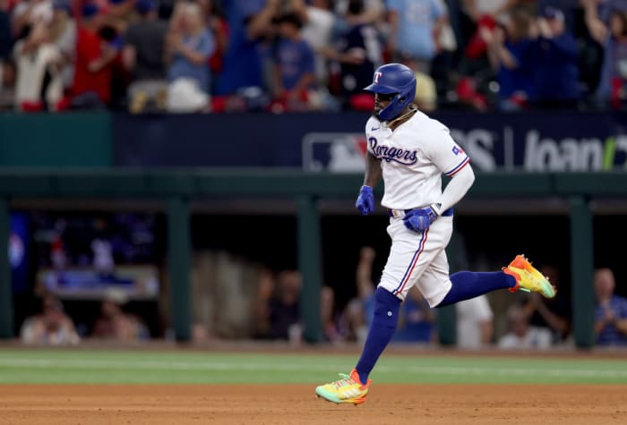 Oct 20, 2023; Arlington, Texas, USA; Texas Rangers right fielder Adolis Garcia (53) rounds the bases after hitting a three-run home run during the sixth inning of game five in the ALCS against the Houston Astros for the 2023 MLB playoffs at Globe Life Field. Mandatory Credit: Andrew Dieb-USA TODAY Sports
